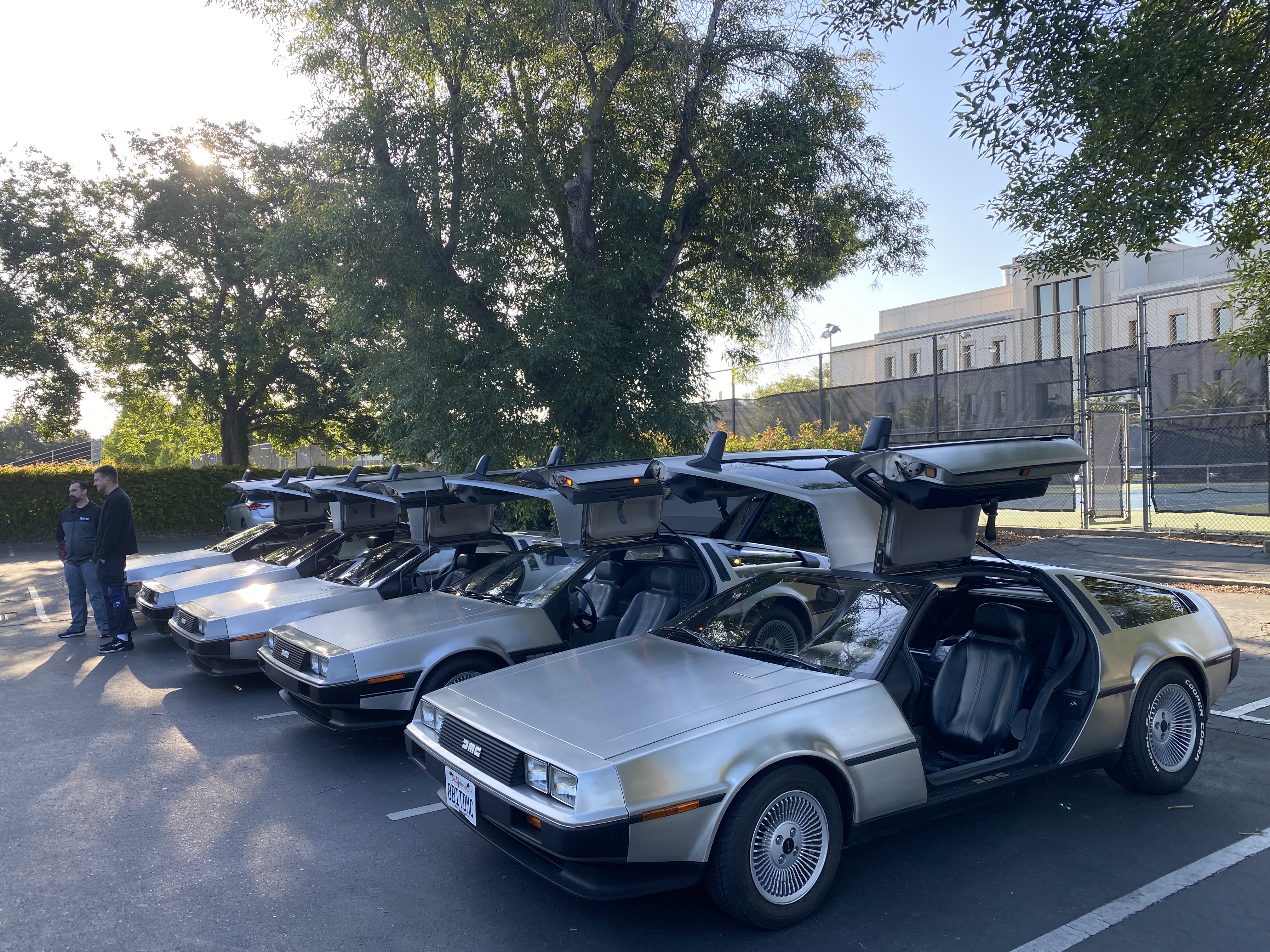 Staged DeLoreans in a parking lot
